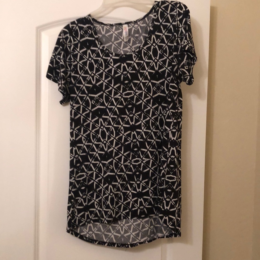 Lularoe black and white print top. Size Large. Good used condition